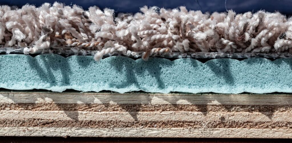 carpet-padding-and-plywood-layers-for-installation-of-flooring