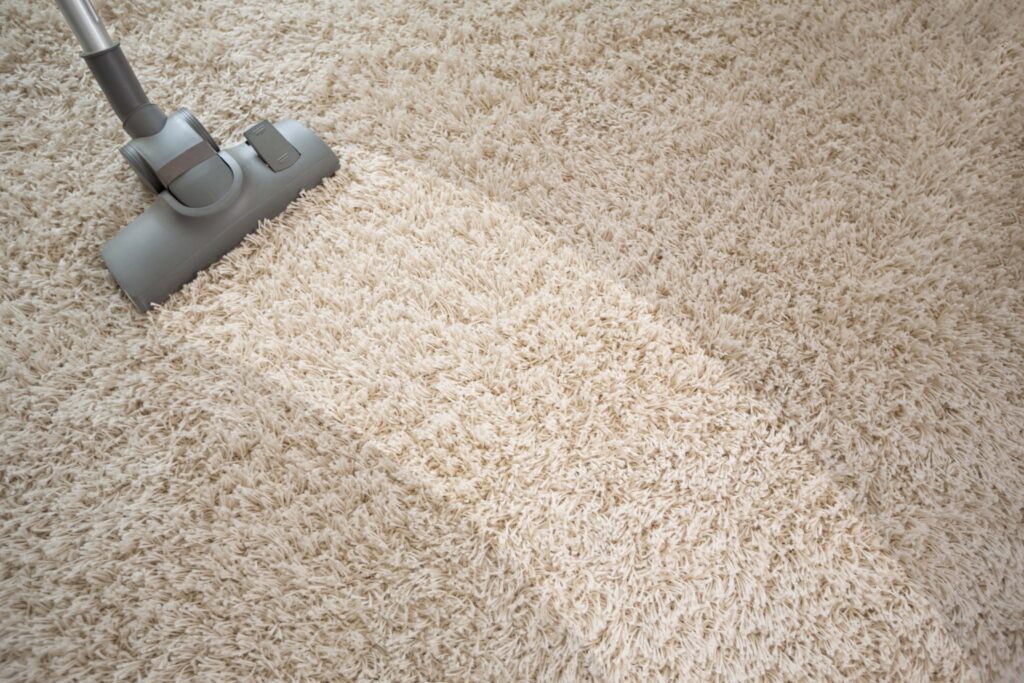 vacuuming carpet