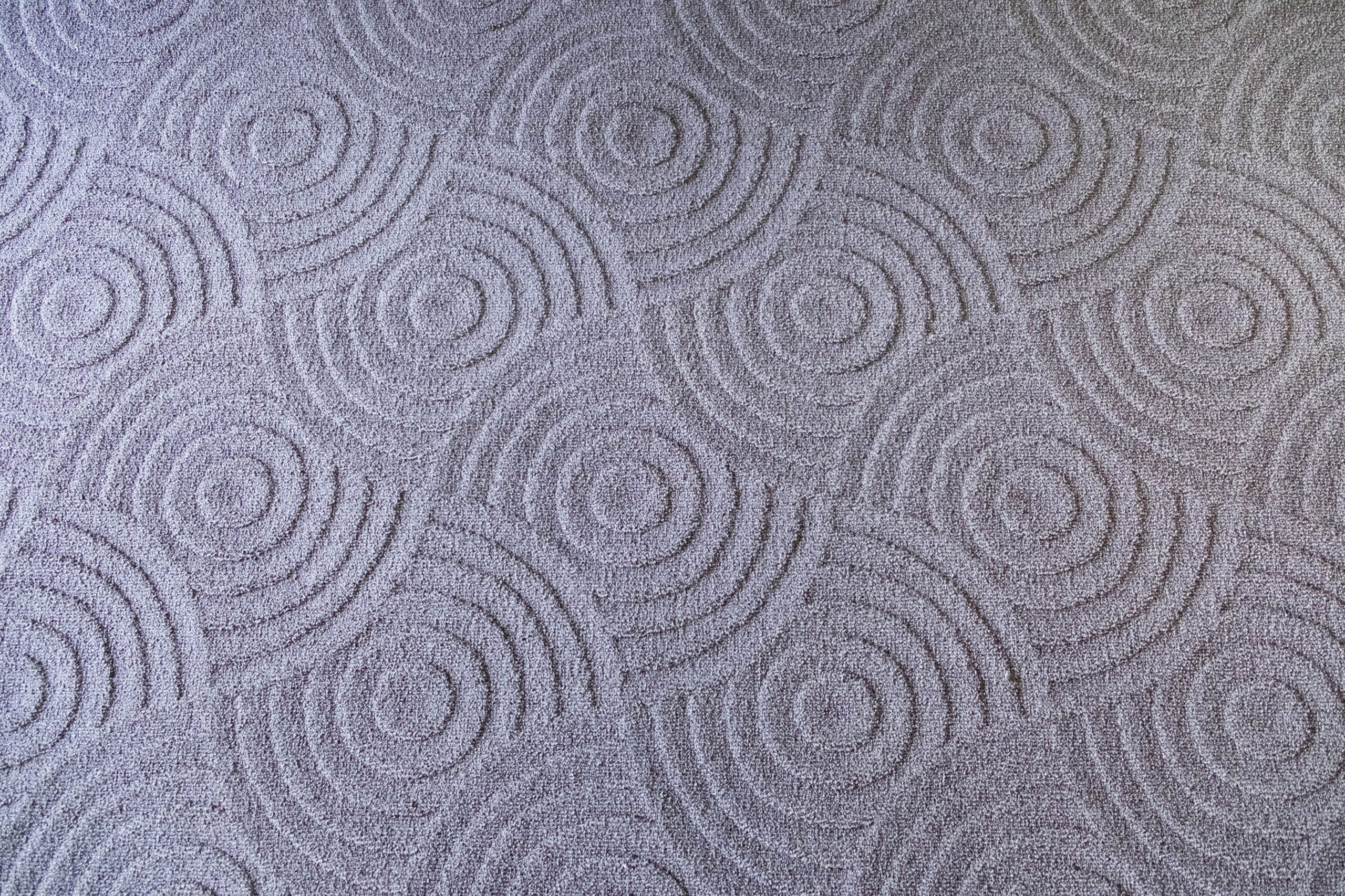 up-close picture of patterned carpet