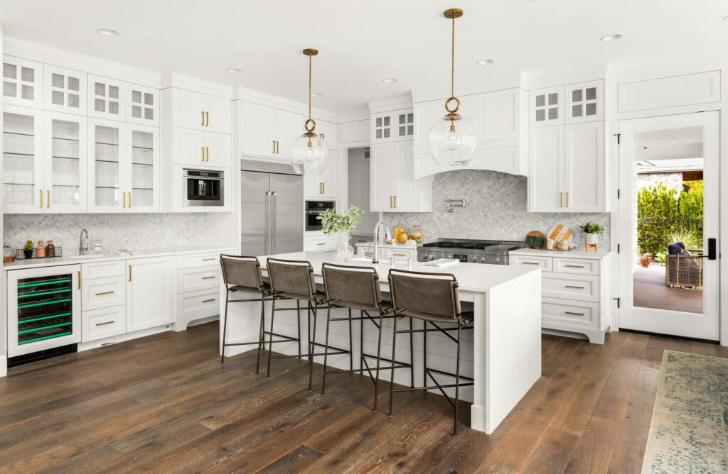 Farmhouse style kitchen with white cabinets