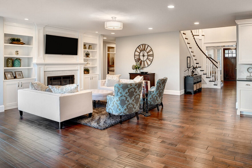 wood flooring in living room and entryway