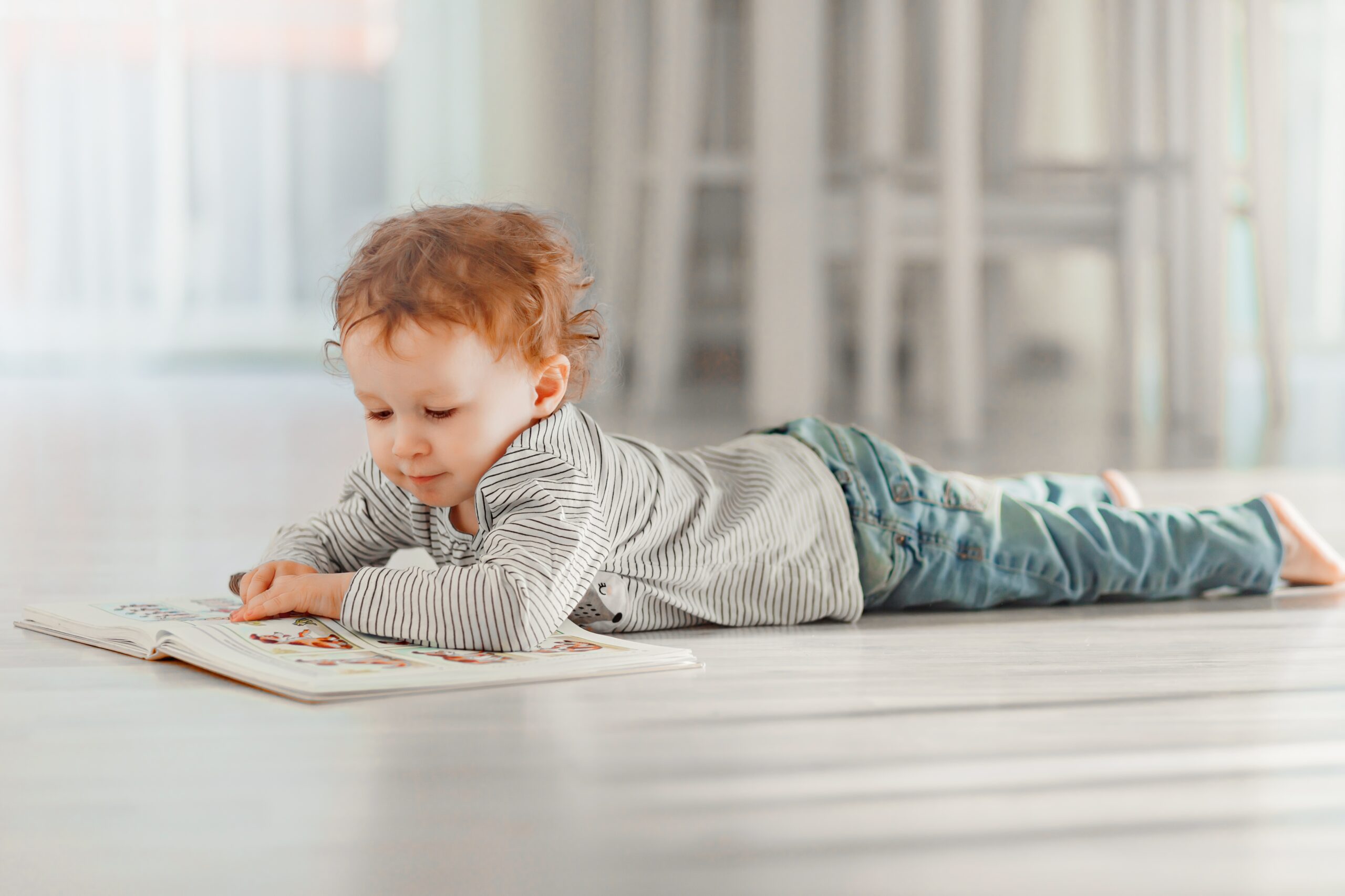 little-girl-about-2-years-old-in-a-light-interior-2023-11-27-05-24-11-utc