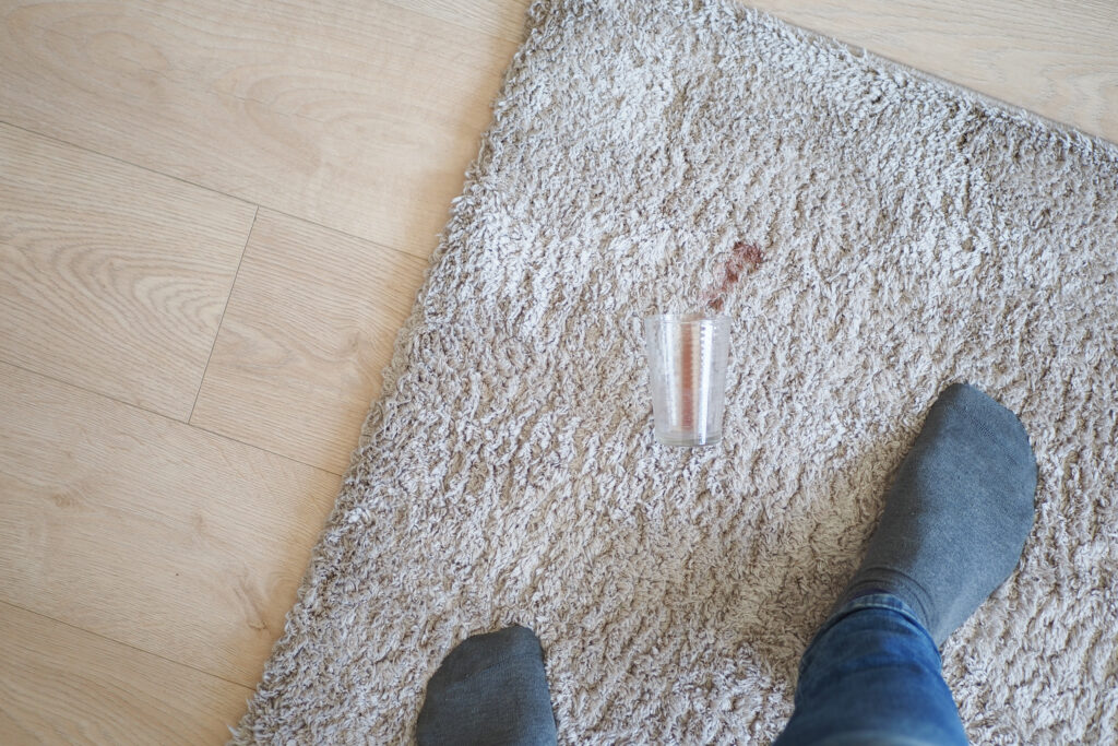 spill water on a carpet top view ,